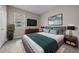 Cozy primary suite with television, sleek decor, and plenty of light at 13915 Mount Laurel Trl, Bradenton, FL 34211