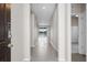 Neutral entryway leads to the open floor plan and view of the lake at 13915 Mount Laurel Trl, Bradenton, FL 34211