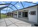 A spacious outdoor patio area is equipped with an outdoor kitchen at 13915 Mount Laurel Trl, Bradenton, FL 34211