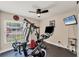 Exercise room featuring workout equipment and a flat screen TV at 1612 Shady Leaf Dr, Valrico, FL 33596
