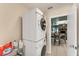 Laundry room with stacked washer and dryer at 1612 Shady Leaf Dr, Valrico, FL 33596