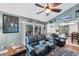 The living room features vaulted ceilings, rustic decor and a view into the open-concept kitchen at 1612 Shady Leaf Dr, Valrico, FL 33596