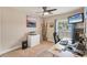 Office with neutral carpet and walls, a large desk, and an abundance of sunlight at 1612 Shady Leaf Dr, Valrico, FL 33596