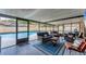 Enclosed patio featuring comfortable seating and a view of the pool at 1612 Shady Leaf Dr, Valrico, FL 33596