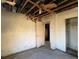 Bedroom showing damaged walls, ceiling, and flooring at 1758 35Th St, Sarasota, FL 34234