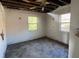 Bedroom showing damaged walls, ceiling and floor at 1758 35Th St, Sarasota, FL 34234
