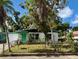 Charming single-story home with a well-maintained lawn and mature landscaping at 1758 35Th St, Sarasota, FL 34234