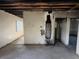 This is a living room with exposed beams and fire damage at 1758 35Th St, Sarasota, FL 34234