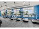 Bright gym featuring modern treadmills with views, providing an optimal space for fitness and well-being at 17728 Polo Trail, Lakewood Ranch, FL 34211