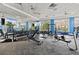 Modern gym featuring free weights and various weight machines, providing a comprehensive workout experience at 17728 Polo Trail, Lakewood Ranch, FL 34211