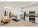 Modern kitchen features stainless steel appliances, granite counters, and a stylish island at 17728 Polo Trail, Lakewood Ranch, FL 34211