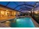 Sparkling pool and spa in screened enclosure, perfect for evening relaxation at 17728 Polo Trail, Lakewood Ranch, FL 34211