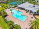 Aerial view of the community pool, tennis courts, and clubhouse at 17728 Polo Trail, Lakewood Ranch, FL 34211