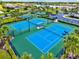 Aerial view of the community's well-maintained tennis courts at 17728 Polo Trail, Lakewood Ranch, FL 34211