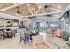 Spacious lounge area with high ceilings, coffee bar, and comfortable seating, perfect for socializing and relaxation at 23528 Awabuki Dr # 101, Venice, FL 34293