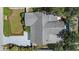 Birds-eye view of a well-maintained property featuring a large roof and lush landscaping at 2646 Martin St, Sarasota, FL 34237