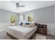 Main bedroom featuring two large windows providing natural light and neutral decor at 2646 Martin St, Sarasota, FL 34237