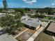 An aerial perspective of the home's well-maintained roof, landscaping, and neighborhood setting at 2708 27Th Avenue W Dr, Bradenton, FL 34205