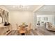 Dining area showcasing a round table with wooden chairs and stylish decor at 2825 Pinecrest St, Sarasota, FL 34239