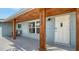 Attractive front porch with wooden posts, modern lighting, and clear numbering for easy visibility at 2825 Pinecrest St, Sarasota, FL 34239