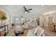 Spacious open-concept living area with stylish decor, connecting dining and kitchen spaces at 2825 Pinecrest St, Sarasota, FL 34239
