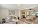 Bright and airy living room featuring a modern design and a view into other living spaces at 2825 Pinecrest St, Sarasota, FL 34239
