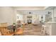 Open concept living space with dining area seamlessly connecting to a cozy lounge at 2825 Pinecrest St, Sarasota, FL 34239