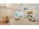 Open-concept kitchen and dining area flowing into a living space with modern decor at 2825 Pinecrest St, Sarasota, FL 34239