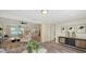 Expansive open-concept living space with seamless transitions and contemporary furnishings at 2825 Pinecrest St, Sarasota, FL 34239