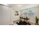 Bright office space with a modern desk, a large window, and stylish decor at 2825 Pinecrest St, Sarasota, FL 34239