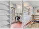 Functional laundry room with utility sink, washer, dryer, and storage cabinets at 3432 Pine Valley Dr, Sarasota, FL 34239