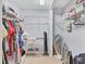 A fully equipped walk-in closet with ample shelving and storage at 3432 Pine Valley Dr, Sarasota, FL 34239