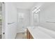 Bathroom featuring single sink vanity and large mirror at 3760 82Nd Avenue E Cir # 102, Sarasota, FL 34243