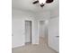Bedroom with closet and ceiling fan is a comfortable and functional space at 3760 82Nd Avenue E Cir # 102, Sarasota, FL 34243