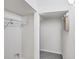 Bright walk-in closet with shelving and tile floor provides ample storage space at 3760 82Nd Avenue E Cir # 102, Sarasota, FL 34243