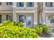 Well-maintained building exterior with neat landscaping and a welcoming entrance at 3760 82Nd Avenue E Cir # 102, Sarasota, FL 34243