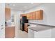Bright kitchen with sleek countertops, stainless steel appliances, and ample cabinet space at 3760 82Nd Avenue E Cir # 102, Sarasota, FL 34243