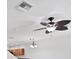 Living room with ceiling fan and light fixture near the kitchen at 3760 82Nd Avenue E Cir # 102, Sarasota, FL 34243