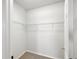 Empty walk-in closet with wire shelving at 3760 82Nd Avenue E Cir # 102, Sarasota, FL 34243