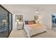 Inviting main bedroom with a ceiling fan, ensuite bath, and closet at 3919 Glen Oaks Manor Dr, Sarasota, FL 34232