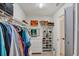 Walk-in closet with shelving, clothing racks, and plenty of storage space at 3919 Glen Oaks Manor Dr, Sarasota, FL 34232