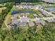 Aerial view of a residential neighborhood with lakes and green spaces at 4015 Quiet Rain Ct, Palmetto, FL 34221