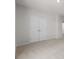 A bedroom has a large closet for storage at 4015 Quiet Rain Ct, Palmetto, FL 34221