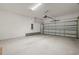 Spacious two-car garage with an epoxy floor at 4015 Quiet Rain Ct, Palmetto, FL 34221