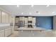 Open concept kitchen features granite counters, white subway tile and stainless-steel appliances at 4015 Quiet Rain Ct, Palmetto, FL 34221