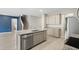 Modern kitchen with granite island and stainless-steel appliances at 4015 Quiet Rain Ct, Palmetto, FL 34221