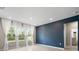 Spacious living room with lots of natural light and neutral tones at 4015 Quiet Rain Ct, Palmetto, FL 34221