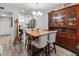 Cozy dining area featuring a wooden table, modern chairs, and decorative accents at 4189 Heron Way # 406E, Bradenton, FL 34205