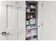 Organized pantry with shelving and ample storage for kitchen essentials and supplies at 4189 Heron Way # 406E, Bradenton, FL 34205