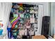 Well-organized storage space with multiple shelves and a variety of bins and containers at 4189 Heron Way # 406E, Bradenton, FL 34205